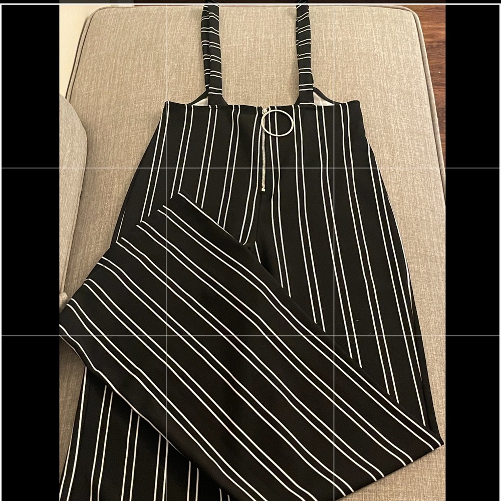 Black and. White pants size medium